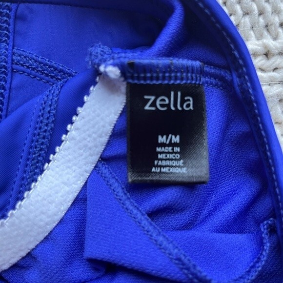 Zella athletic tank top with racerback and mesh straps. Purple with black mesh. - Picture 2 of 5